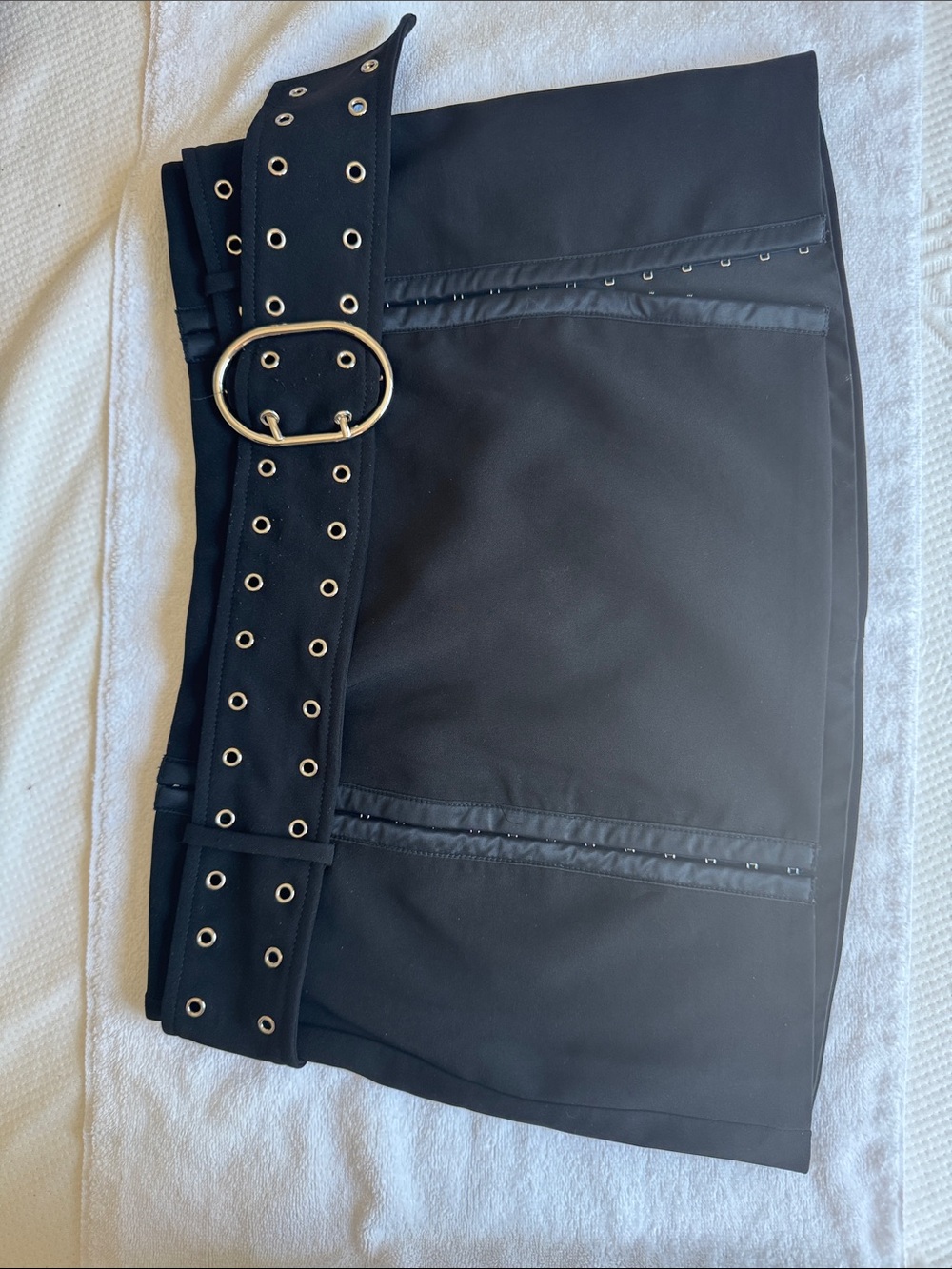 Edgy Black Mini Skirt with Grommet Belt